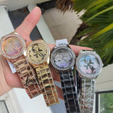 Guess G Twist Diamonds Silver Dial Silver Steel Strap Watch For Women - W1201L1