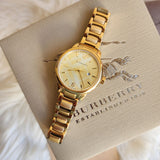 Burberry The Classic Champagne Dial Gold Steel Strap Watch for Women - BU10109