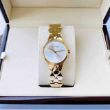 Calvin Klein Snake Silver Dial Yellow Gold Steel Strap Watch For Women - K6E23546