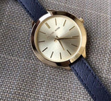 Michael Kors Runway Quartz Gold Dial Blue Leather Strap Watch For Women - MK2285