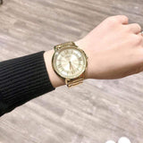 Guess Montauk Gold Dial Gold Steel Strap Watch for Women - W0933L2