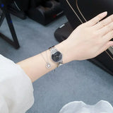 Calvin Klein Snake Black Dial Silver Steel Strap Watch For Women - K6E23141