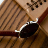 Daniel Wellington Petite Sterling Black Dial Brown Leather Strap Watch For Women - DW00100178