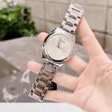 Guess Cubed Analog Silver Dial Silver Steel Strap Watch For Women - GW0606L1