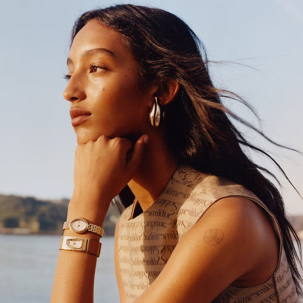 Tory Burch Oval Mother of Pearl Dial Gold Steel Strap Watch for Women - TBW6034