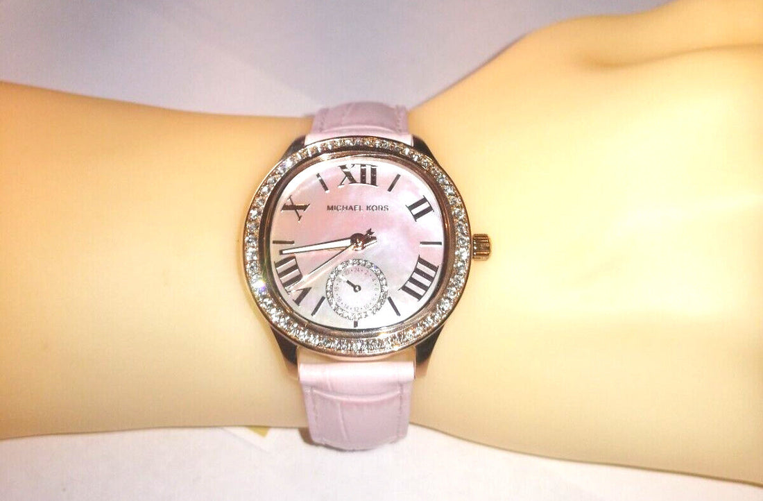 Michael Kors Sage Three-Hand Mother of Pearl Pink Dial Pink Leather Strap Watch for Women - MK4820